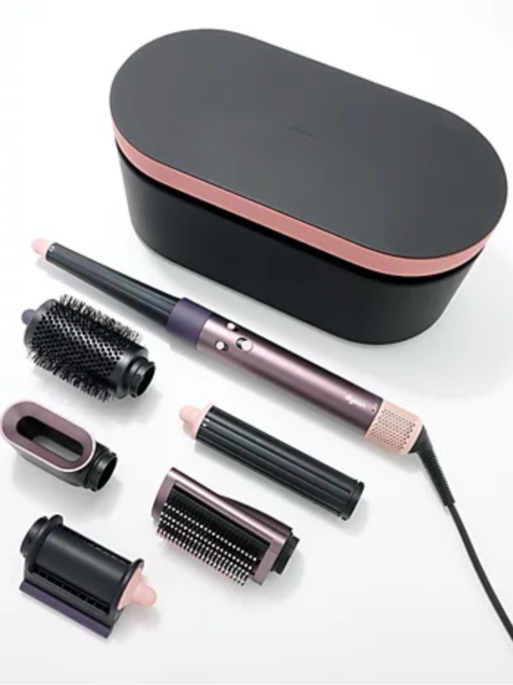 Dyson hair styler in plum with rose gold accents